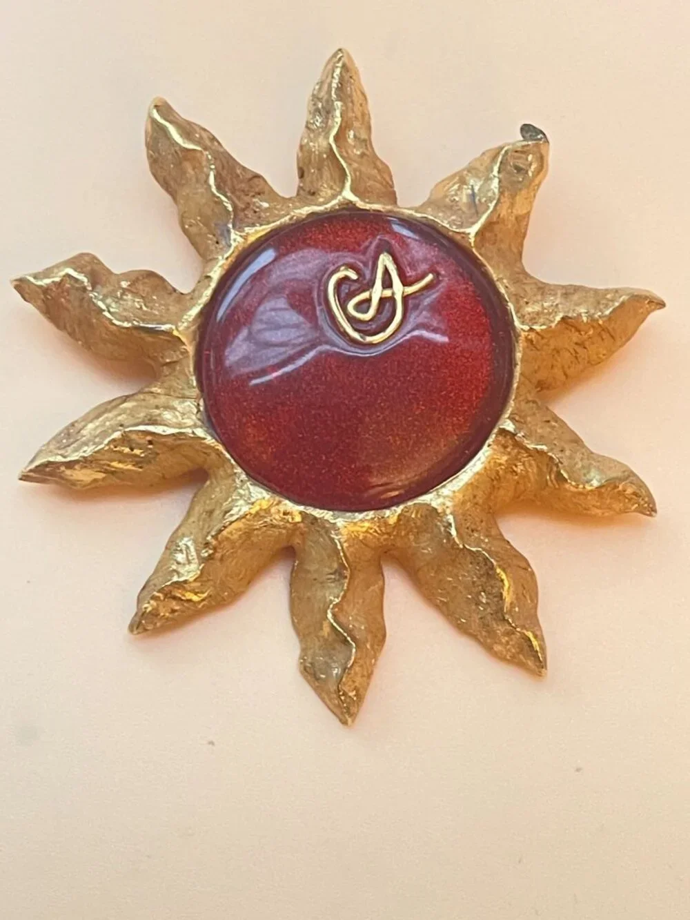 Christian Lacroix Gold-Tone Sun Brooch W/ Red Resin Center & Golden Logo